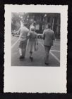 Katherine Anne Porter walking with two men